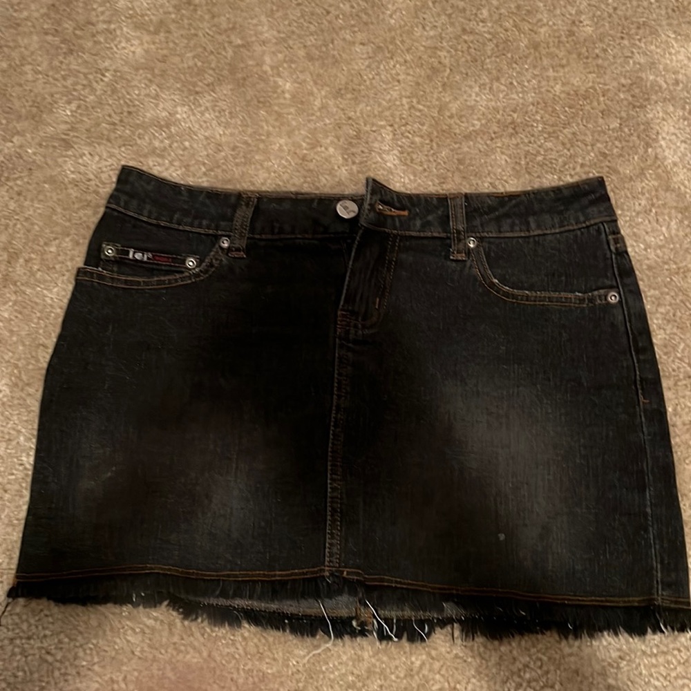Black jean mini skirt. Size 3. Worn a couple of times